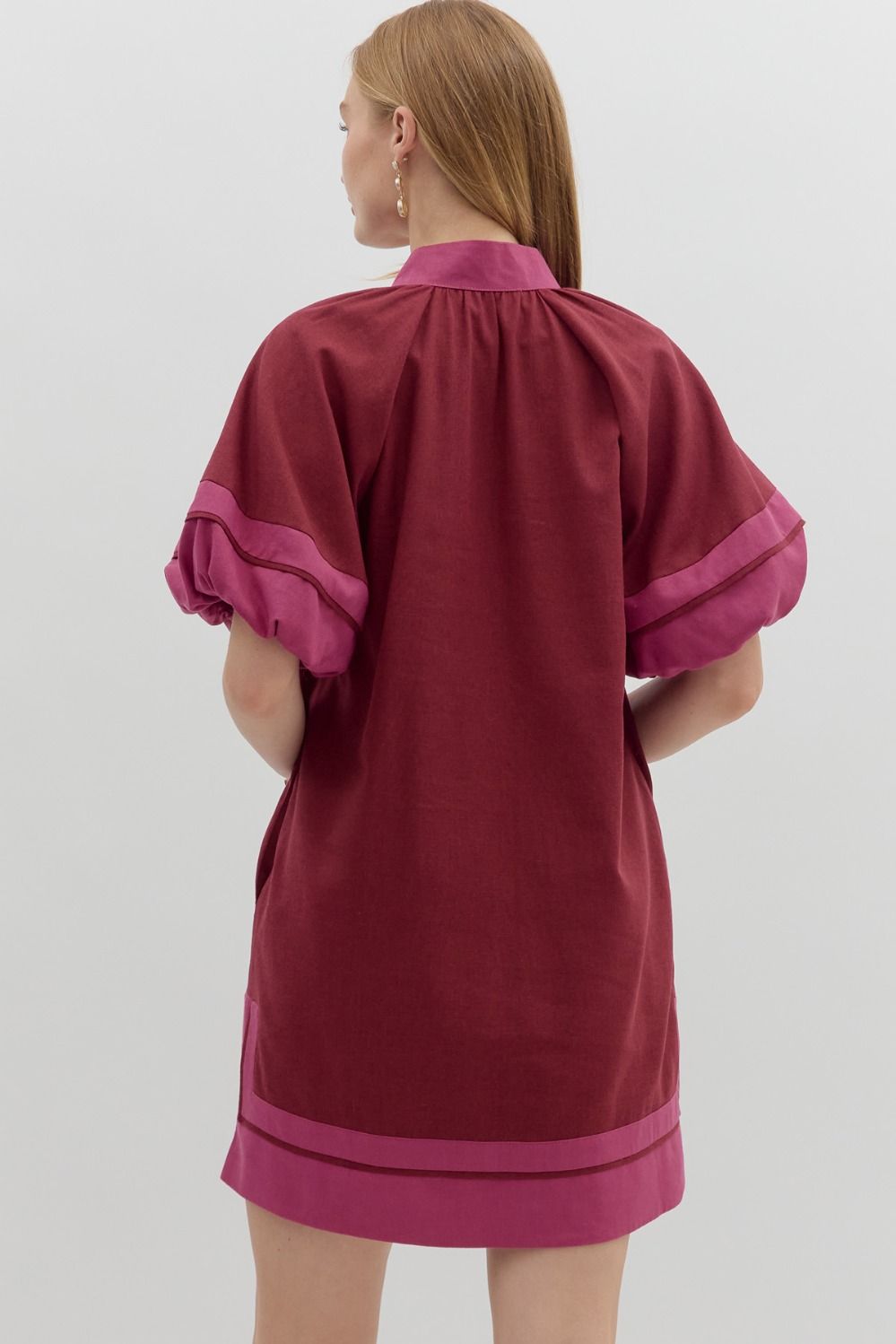 Back view of the Merlot & Magenta Muse Dress showing deep merlot fabric with magenta contrast trim on sleeves and hem, relaxed fit – Milo & Lily Boutique.