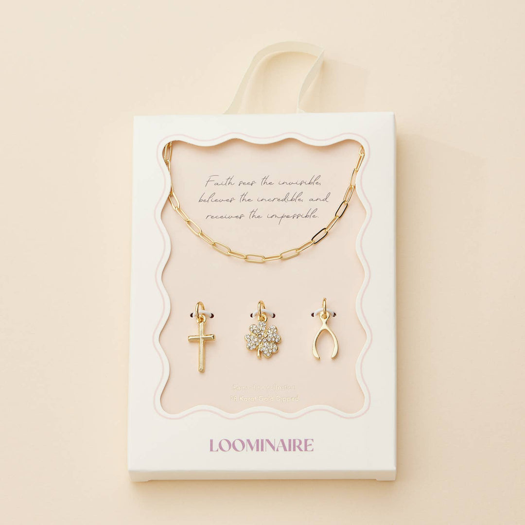 Gold necklace with cross, clover, and wishbone pendants jewelry set in gift box