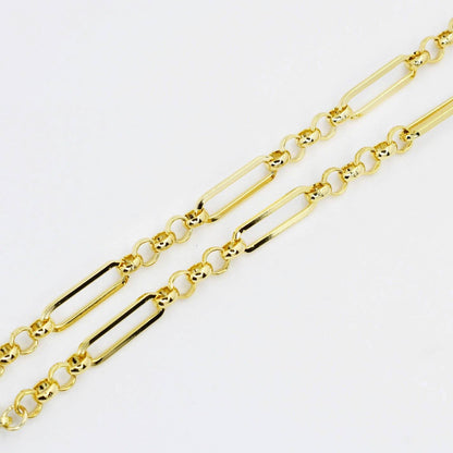 Gold chain necklace with rectangular and round links on a white background