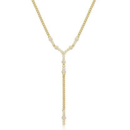 Gold Y-shaped lariat necklace with crystal accents, women's jewelry on white background