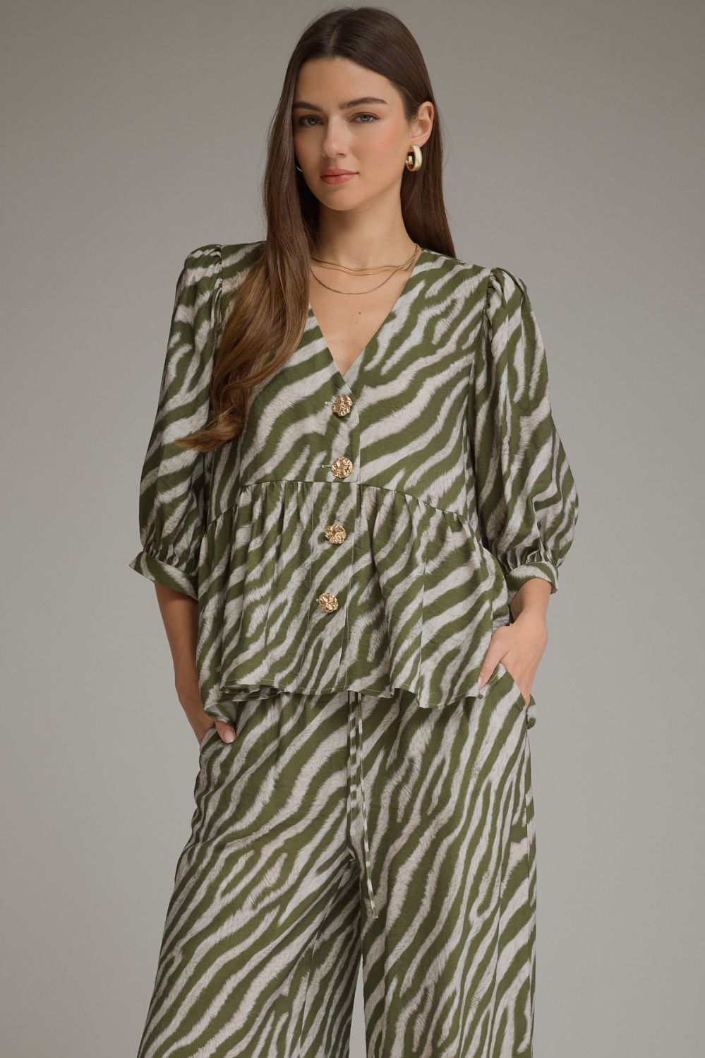 The Sloane Zebra Peplum Top – Olive