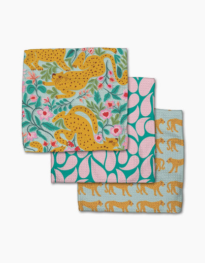 Set of three cotton dish towels with cheetah and floral patterns in bright, colorful designs.