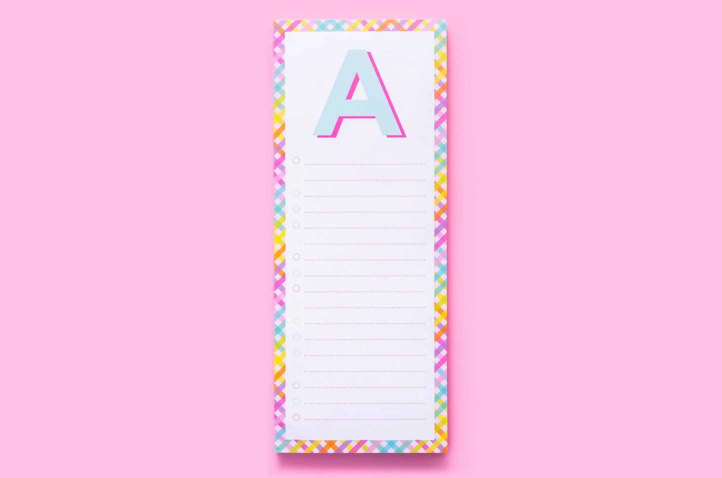 Colorful notepad with letter A, rainbow border, on pink background, stationery gift