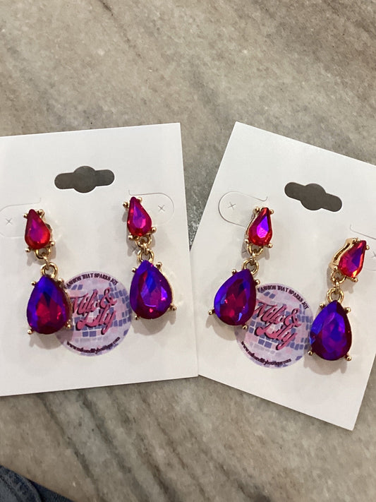 Gold drop earrings with vibrant pink teardrop crystals on display cards