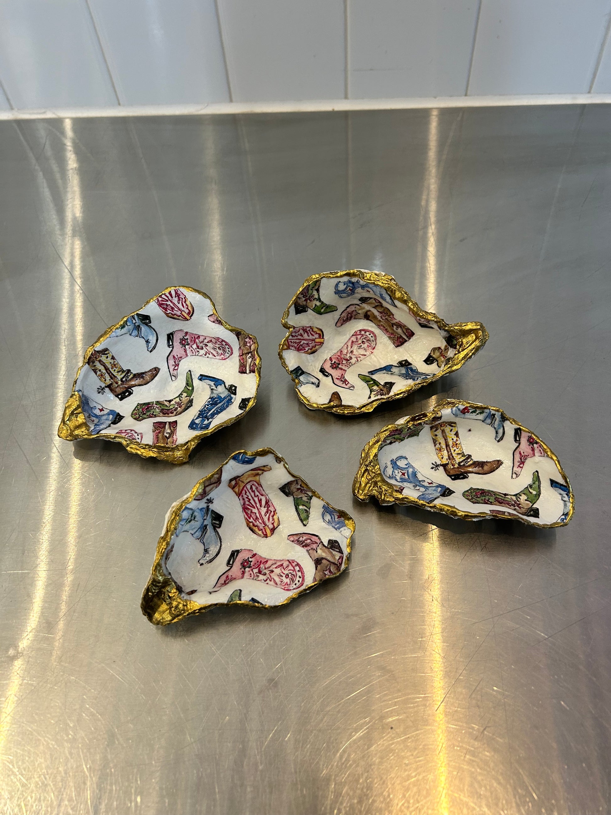 Decorative oyster shell trinket dishes with colorful boot and shoe pattern, gold trim