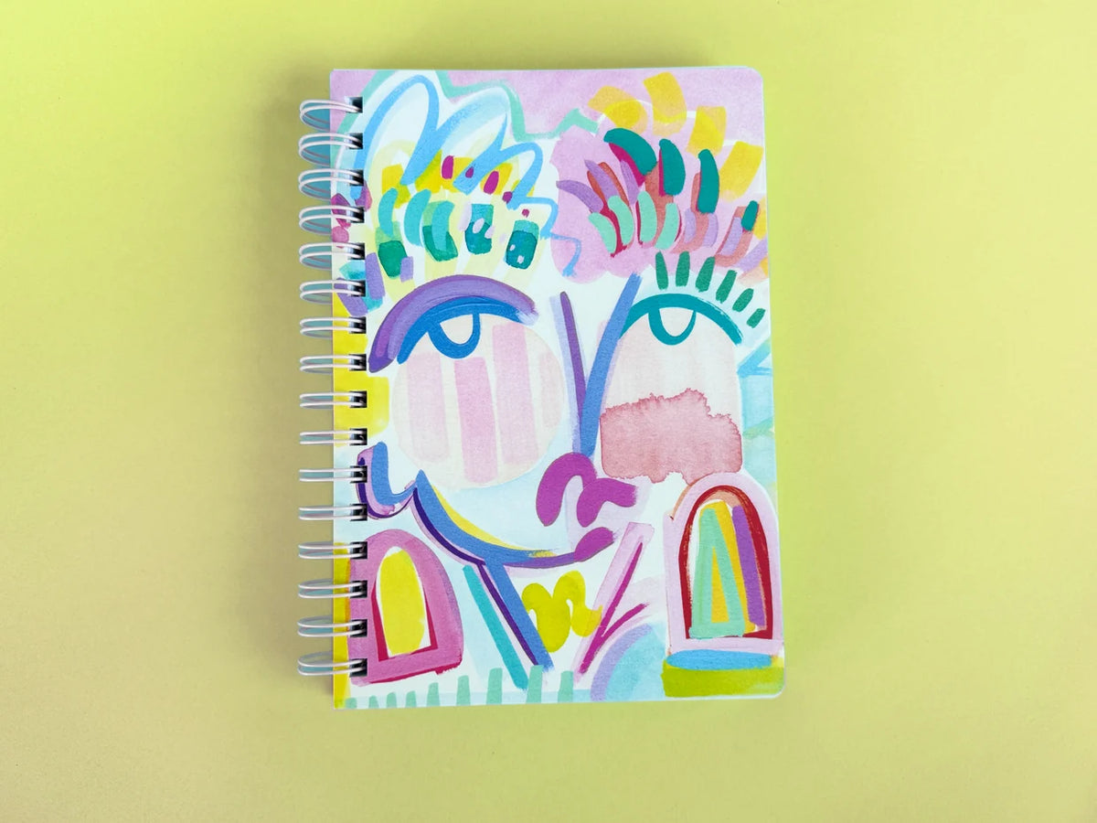 Colorful abstract notebook on a yellow background