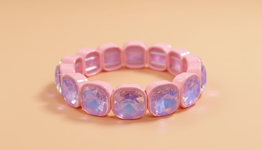 Pink bracelet with iridescent stones on a beige background