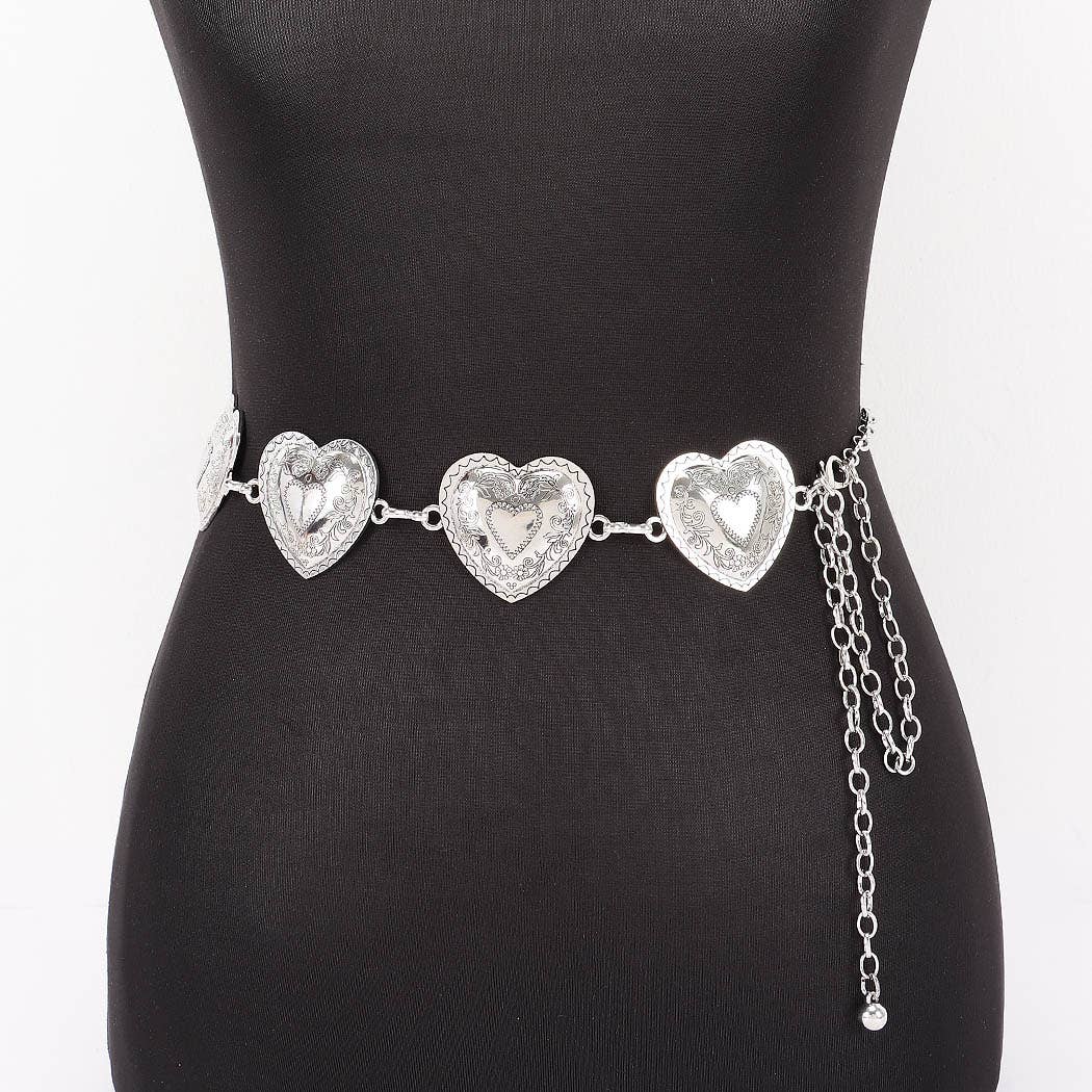 A silver heart-patterned waist chain displayed on a black mannequin torso against a white background.
