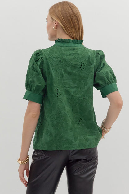 Back view of the Emerald Bloom Eyelet Top showing green floral eyelet embroidery, puff sleeves with cuffs, and ruffled collar detail – Milo & Lily Boutique.
