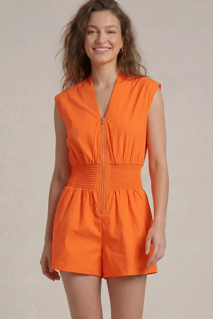Women’s bright orange sleeveless romper for Oklahoma State game day and Stillwater football tailgates