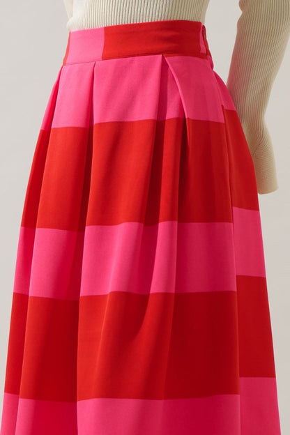 Red and pink striped skirt on a neutral background
