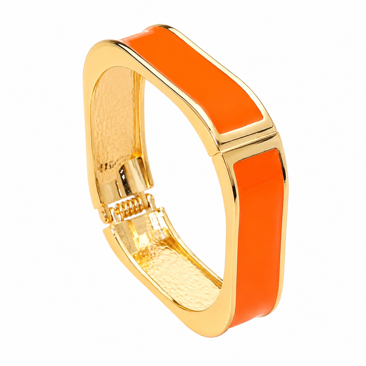 A gold-plated adjustable bangle bracelet with vibrant orange enamel inlay, shown on a clean white background.