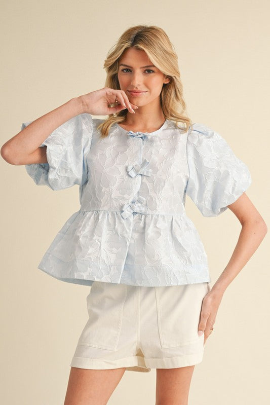 jacquard floral peplum top with bows