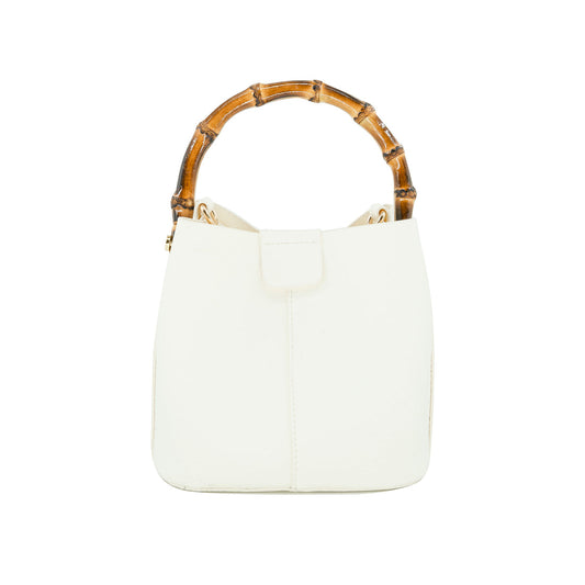 White handbag with a brown bamboo handle on a white background