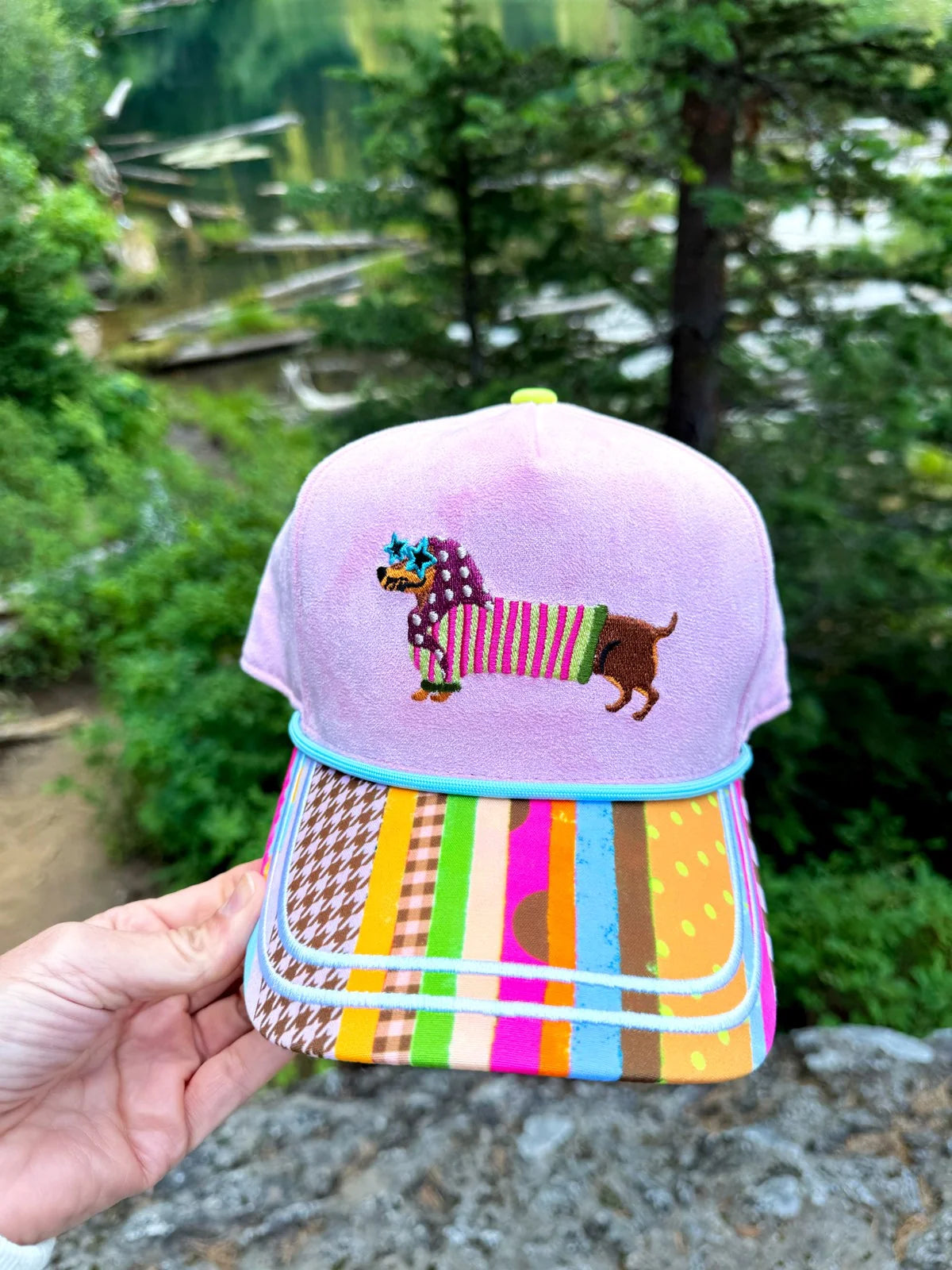 Lavender pink Happy-Go-Doxie embroidered dachshund baseball cap with colorful patchwork brim
