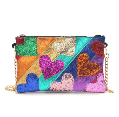 Colorful rainbow crossbody bag with multicolor glitter hearts and gold chain strap from Milo & Lily Boutique