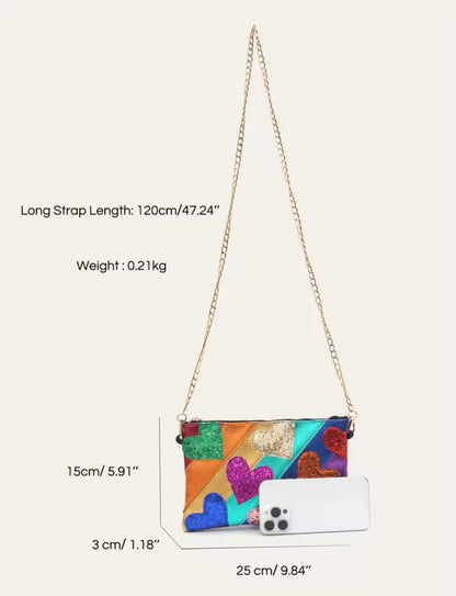 Multicolored handbag with chain strap and measurements on a white background