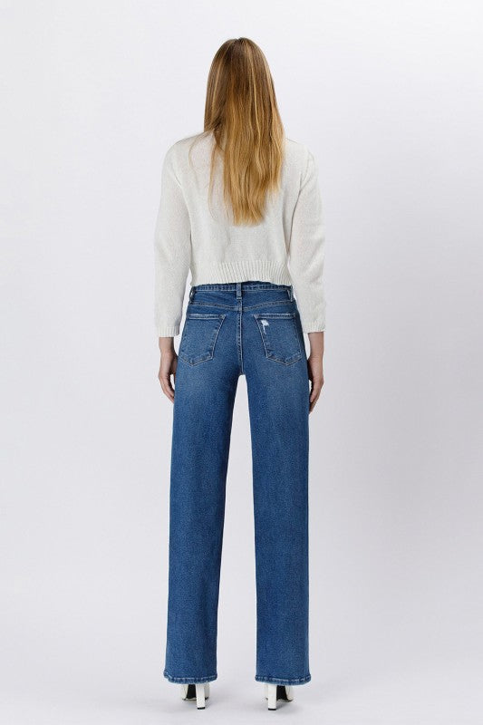 Back view of high-rise straight leg blue jeans with classic pockets and a flattering fit — everyday wardrobe essential from Milo & Lily Boutique.