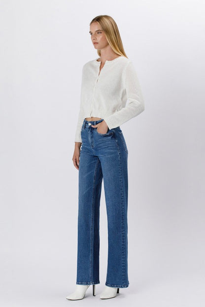 Side view of high-rise straight leg blue jeans for women featuring a classic medium wash and tailored fit — boutique denim from Milo & Lily Boutique.