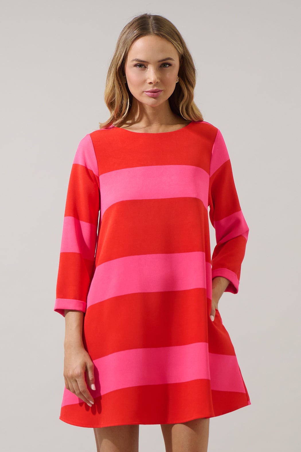 Front view of candy cane stripe dress with 3/4 sleeves