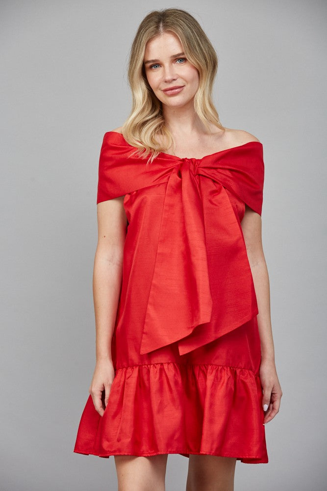 Front view of red off-the-shoulder satin mini dress with large bow detail