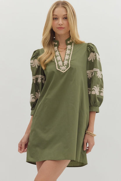Model wearing an olive green embroidered mini dress with puff sleeves and v-neck detail — boutique fall style from Milo & Lily.