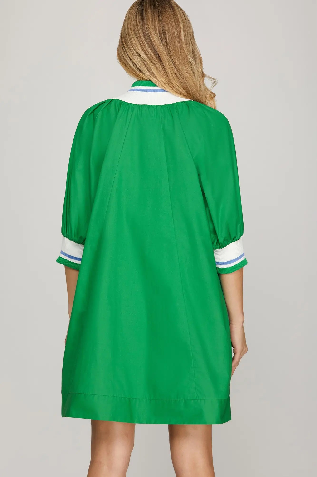 Sporty chic green mini dress with relaxed fit and preppy collar detail