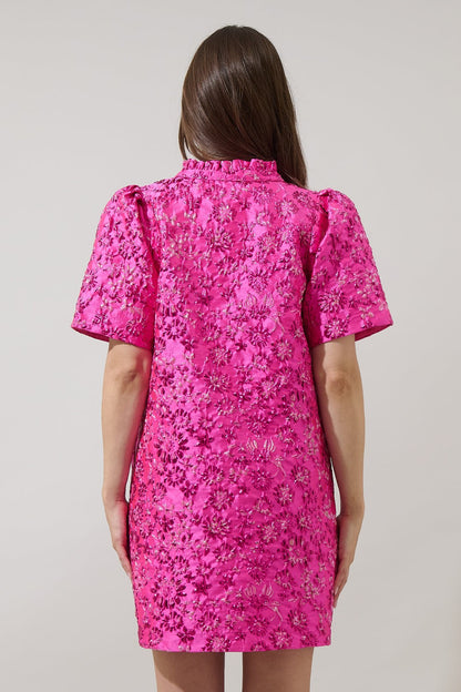 Back view of The Pink Posh Mini showing pink floral embroidered fabric and puff sleeves from Milo & Lily Boutique.