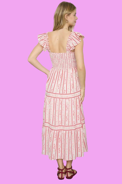 back view red floral smocked midi dress with tiered skirt and ruffle straps