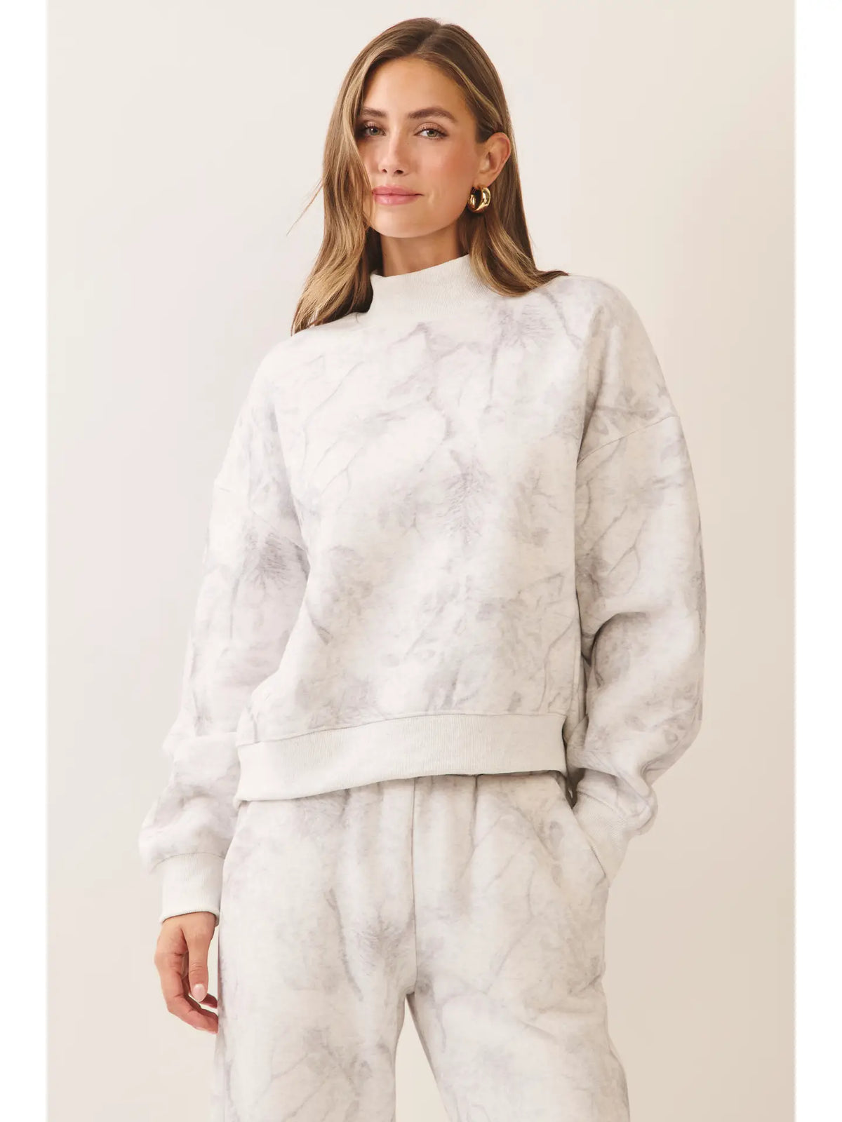 Ivory grey marbled mock neck women's sweatshirt model front view